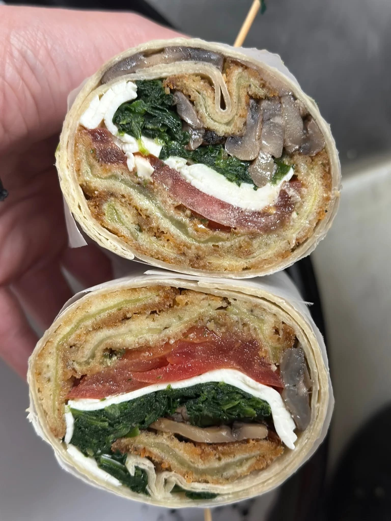 Fried Chicken Cutlet wrap — crispy cutlet with fresh mozzarella, tomato, and spinach