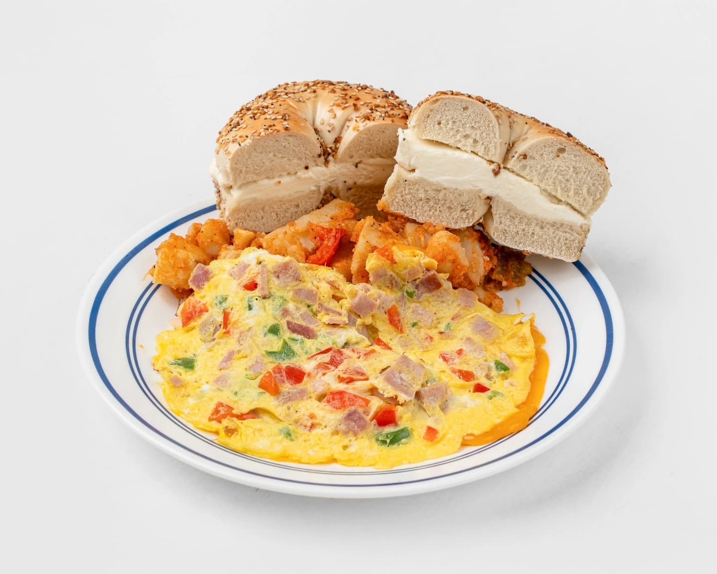 Western omelette with home fries and a bagel